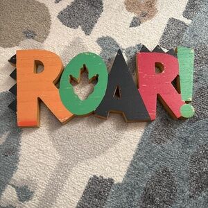 Roar wood sign